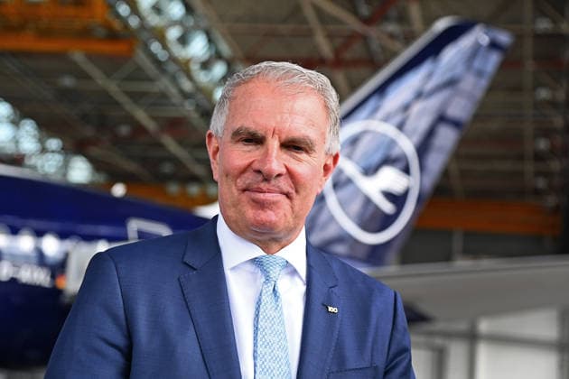 Carsten SPOHR Chairman Lufthansa in front of the Lufthansa Jet Airbus A 350 900 Rostock single image,cropped single motif,portrait,portrait,portrait anniversary 100 years Lufthansa on 23 03 2026 in the aircraft hangar Flight Operation Center at Franz Josef Strauss Airport in Munich
