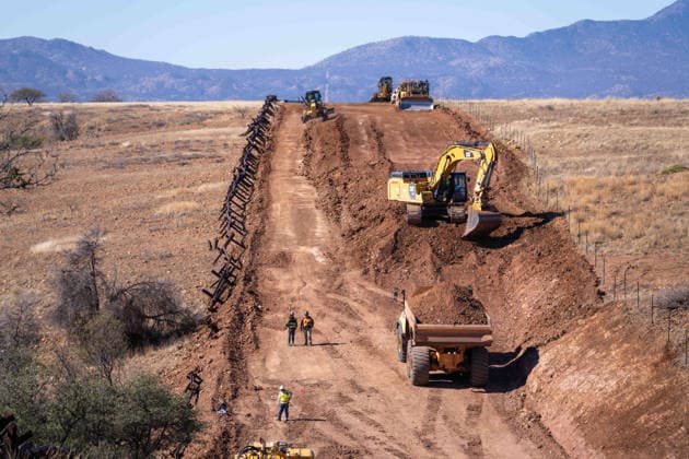 March 24, 2026, Sierra Vista, Az, United States: Workers cut a road through a the Coronado National Memorial along where the new border wall system separating Mexico from the United States will be constructed, January 15, 2026, southwest of Sierra Vista, Arizona. Trump has spent nearly 8 billion dollars building the wall making it the most expensive public works project in history. Sierra Vista United States - ZUMAp138 20260324_zaa_p138_002 Copyright: xJerryxGlaser Cbpx