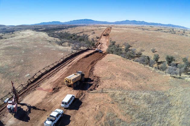 March 24, 2026, Sierra Vista, Az, United States: Workers cut a road through a the Coronado National Memorial along where the new border wall system separating Mexico from the United States will be constructed, January 15, 2026, southwest of Sierra Vista, Arizona. Trump has spent nearly 8 billion dollars building the wall making it the most expensive public works project in history. Sierra Vista United States - ZUMAp138 20260324_zaa_p138_006 Copyright: xJerryxGlaser Cbpx