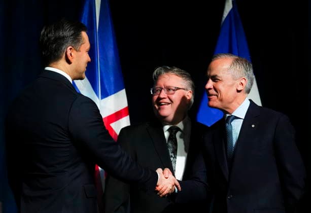 March 24, 2026, Ottawa, Canada: Prime Minister Mark Carney talks with Conservative Leader Pierre Poilievre, left, and Conservative member of Parliament Richard Bragdon, middle, as they attend the National Prayers Breakfast in Ottawa on Tuesday, March 24, 2026. Ottawa Canada  - ZUMAc35_ 20260324_zaf_c35_008 Copyright: xSeanxKilpatrickx