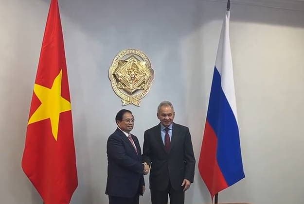 RUSSIA, MOSCOW - MARCH 24, 2026: Vietnam s Prime Minister Pham Minh Chinh and Russian Security Council Secretary Sergei Shoigu shake hands during a meeting. Video grab. Best possible quality. TASS  90498169
