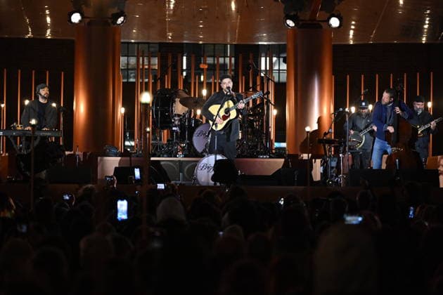 March 25, 2026, London, London, UK: London, UK. Marcus Mumford, Ben Lovett, and Ted Dwane of British folk-rock band Mumford and Sons perform at the Apple 50th Anniversary Event held at Battersea Power Station. Apple was founded by Steve Jobs, Steve Wozniak, and Ronald Wayne fifty years ago on 1st April 1976. London UK  - ZUMAl94_ 20260325_zaf_l94_036 Copyright: xLondonxNewsxPicturesx