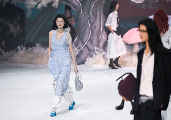 (260326) -- SHANGHAI, March 26, 2026 -- Models present creations of HPLY during the 2026 Autumn Winter Shanghai Fashion Week in east China s Shanghai, March 25, 2026. The fashion week opened here on Wednesday. ) CHINA-SHANGHAI-FASHION WEEK(CN) ChenxHaoming 