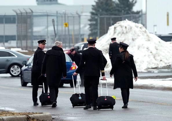 March 26, 2026, Ottawa, On, CAN: Pilots make their way to Skyservice FBO for the arrival of the repatriation flight of Jazz Aviation First Officer Mackenzie Gunther, who died after his Air Canada Express plane collided with a fire truck at New York s LaGuardia Airport, in Ottawa, on Thursday, March 26, 2026. Ottawa CAN  - ZUMAc35_ 20260326_zaf_c35_087 Copyright: xJustinxTangx