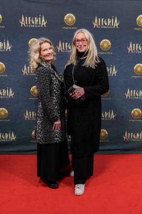26 03 2026 Düsseldorf Cirque du Soleil Alegria Red Carpet on the evening of the Düsseldorf premiere Here Katja Mitchell r with escort Düsseldorf Gerresheim Glasmacherviertel North Rhine-Westphalia Germany