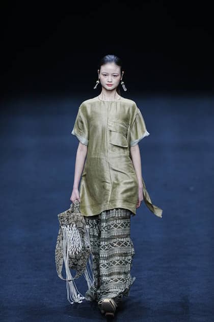 RECORD DATE NOT STATED 2026 China International Fashion Week A model walks the runway at the A.1 Fashion Changes Life show by designer Jiayu Xu during 2026 China International Fashion Week on March 27, 2026 in Beijing, China. (Photo by Peter Li Nexpher Images) Beijing Beijing