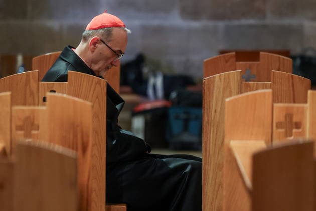 Cardinal Pierbattista Pizzaballa, the Latin Patriarch of Jerusalem, sits in the Church of All Nations on the day of a prayer service to mark Palm Sunday, following the cancellation of the traditional Palm Sunday procession from the Mount of Olives, amid restrictions on gathering in large groups and the U.S.-Israeli conflict with Iran, in Jerusalem on Sunday, March 29, 2026. Pool photo by Ammar Awad  JERX20260329207 AmmarxAwad