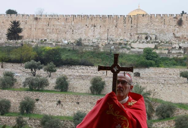 Cardinal Pierbattista Pizzaballa, the Latin Patriarch of Jerusalem, holds a prayer service to mark Palm Sunday, following the cancellation of the traditional Palm Sunday procession from the Mount of Olives, amid restrictions on gathering in large groups and the U.S.-Israeli conflict with Iran, in Jerusalem on Sunday, March 29, 2026. Pool photo by Ammar Awad  JERX20260329218 AmmarxAwad
