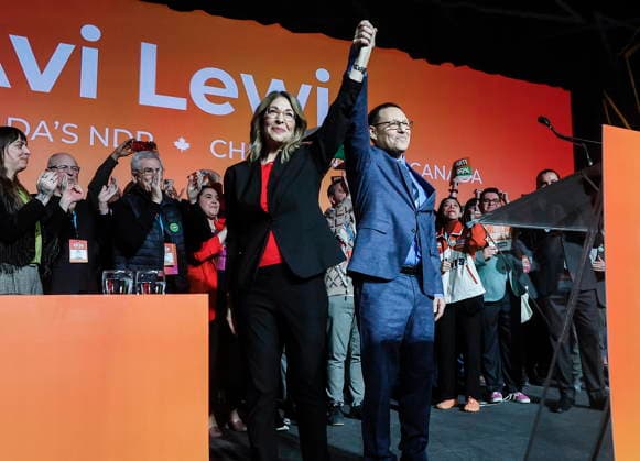 March 29, 2026, Winnipeg, Manitoba, CANADA: Avi Lewis, who was proclaimed as the new leader of the NDP, celebrates with Naomi Klein and supporters at the party convention in Winnipeg Sunday, March 29, 2026. Winnipeg CANADA  - ZUMAc35_ 20260329_zaf_c35_026 Copyright: xJohnxWoodsx