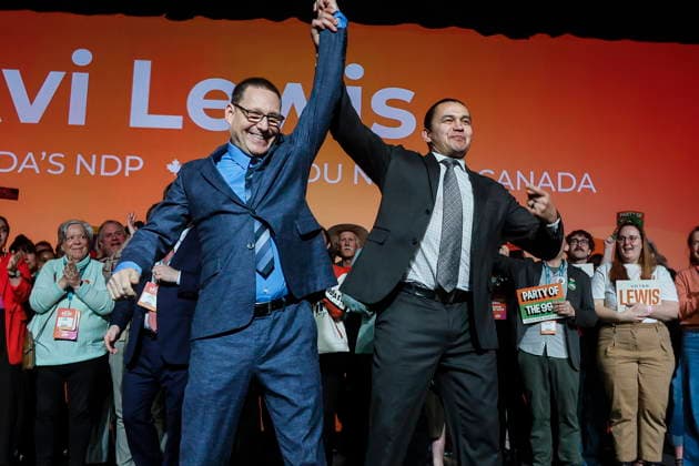 March 29, 2026, Winnipeg, Manitoba, CANADA: Avi Lewis, left, who was proclaimed as the new leader of the NDP, celebrates with Manitoba premier Wab Kinew at the party convention in Winnipeg Sunday, March 29, 2026. Winnipeg CANADA  - ZUMAc35_ 20260329_zaf_c35_027 Copyright: xJohnxWoodsx