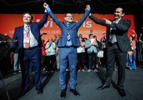 March 29, 2026, Winnipeg, Manitoba, CANADA: Avi Lewis, centre, who was proclaimed as the new leader of the NDP, celebrates with former interim leader Don Davies, left, and Manitoba premier Wab Kinew at the party convention in Winnipeg Sunday, March 29, 2026. Winnipeg CANADA  - ZUMAc35_ 20260329_zaf_c35_028 Copyright: xJohnxWoodsx