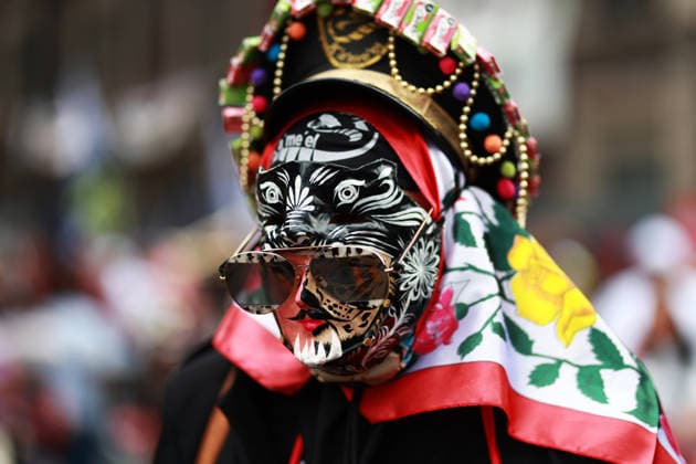 Large-scale carnival parade in Mexico City MEXICO CITY, MEXICO - MARCH 29: A masked man in traditional costume participates in a large-scale carnival parade, in Mexico City, Mexico on March 29, 2026. More than 7,000 participants from neighborhoods across Mexico City, dressed in colorful attire linked to Mexico s carnival traditions, paraded through the capital s historic center in an event called Carnaval de Carnavales . Daniel Cardenas Anadolu Mexico City Mexico. Editorial use only. Please get in touch for any other usage.  Copyright: x2026xAnadoluxDanielxCardenasx