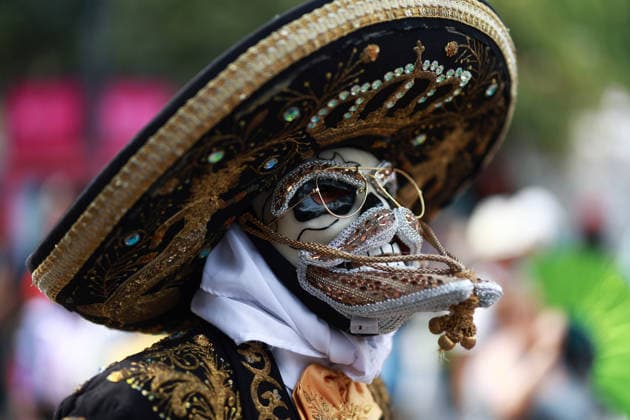 Large-scale carnival parade in Mexico City MEXICO CITY, MEXICO - MARCH 29: A masked man in traditional costume participates in a large-scale carnival parade, in Mexico City, Mexico on March 29, 2026. More than 7,000 participants from neighborhoods across Mexico City, dressed in colorful attire linked to Mexico s carnival traditions, paraded through the capital s historic center in an event called Carnaval de Carnavales . Daniel Cardenas Anadolu Mexico City Mexico. Editorial use only. Please get in touch for any other usage.  Copyright: x2026xAnadoluxDanielxCardenasx