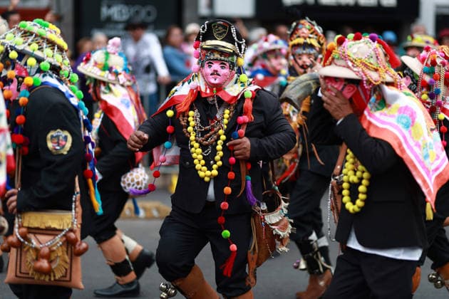 Large-scale carnival parade in Mexico City MEXICO CITY, MEXICO - MARCH 29: Masked men in traditional costume participate in a large-scale carnival parade, in Mexico City, Mexico on March 29, 2026. More than 7,000 participants from neighborhoods across Mexico City, dressed in colorful attire linked to Mexico s carnival traditions, paraded through the capital s historic center in an event called Carnaval de Carnavales . Daniel Cardenas Anadolu Mexico City Mexico. Editorial use only. Please get in touch for any other usage.  Copyright: x2026xAnadoluxDanielxCardenasx