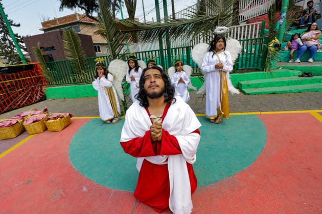 A person portraying Jesus during the Palm Sunday reenactment in the Tenorios neighborhood in the Iztapalapa borough, a tradition over 40 years old, which marks the beginning of the Holy Week liturgical celebrations. on March 29, 2026 in Mexico City, Mexico. Mexico City Mexico - ZUMAe321 20260329_zia_e321_040 Copyright: xIanxRoblesx