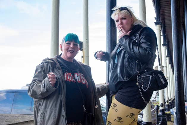 Scarborough Punk Festival 2026, UK - 29 Mar 2026 Punk rockers have a cigarette break during the festival outside the Scarborough Spa. Hundreds of punk rock fans gathered in Scarborough Spa in Yorkshire county, England for the two days long punk rock festival. Scarborough United Kingdom Copyright: xKrisztianxElekx xSOPAxImagesx SSS_20260329_PUNK_FEST_0011005237