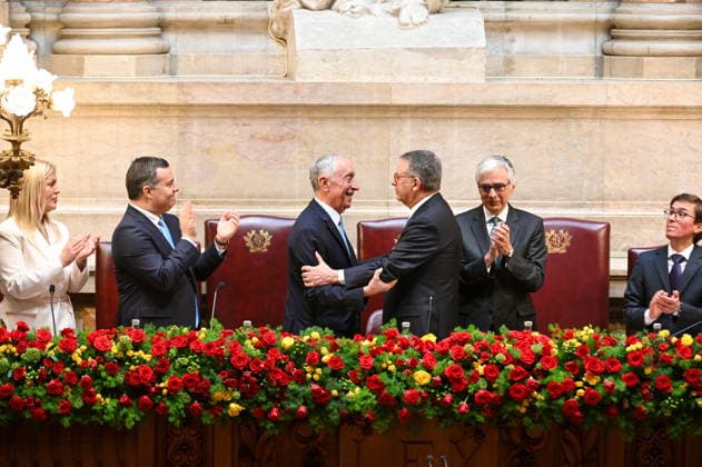 March 30, 2026, Lisbon, Portugal: Former President MARCELO REBELO DE SOUSA (L) and the new President of the Republic ANTONIO JOSE SEGURO (R) sharing a lighthearted moment and embracing before the exchange of seats at the Presidential Table. Also pictured are Vice-President MARCOS PERESTRELLO (L) and the President of the Assembly JOSE PEDRO AGUIAR-BRANCO (C) applauding during the Solemn Session at the Palace of Sao Bento. Lisbon Portugal - ZUMAtial 20260330_mda_r238_404 Copyright: xRicardoxRochax