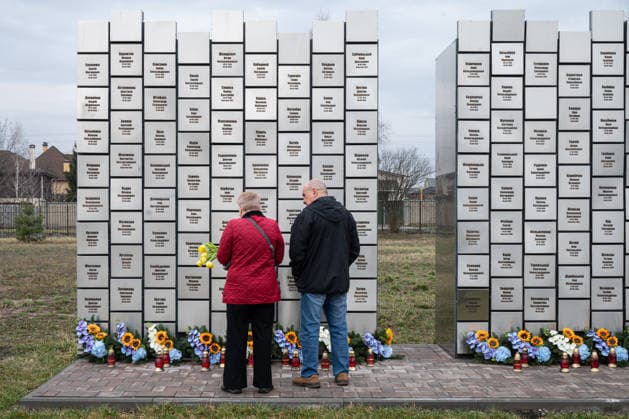 People stand in front of the memorial during a commemorative event for the victims of Russia’s mass killings at the Church of the Holy Apostle Andrew the First-Called and All Saints, attended by Minister of Foreign Affairs of Ukraine Andrii Sybiha and EU High Representative for Foreign Affairs and Security Policy and Vice-President of the European Commission Kaja Kallas, Bucha, Kyiv region, Ukraine, March 31, 2026. (Photo by Danylo Antoniuk Ukrinform) EU Foreign Ministers pay tribute to victims Russia’s mass killings in Bucha  Copyright: xDanyloxAntoniukx