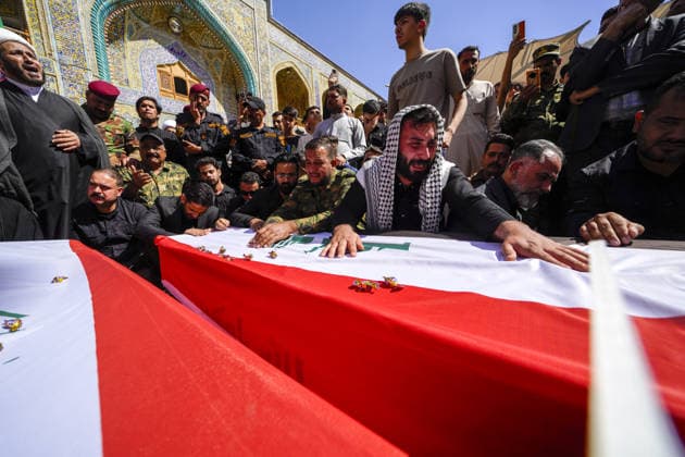 Funeral held in Najaf for Hashd al Shaabi members killed in US and Israeli airstrike NAJAF, IRAQ - APRIL 1: People attend the funeral ceremony of Hashd al Shaabi members killed in a US and Israeli airstrike on a base in Iraq Anbar province, at the Imam Ali shrine in Najaf, Iraq on April 1, 2026. Karar Essa Anadolu Najaf Iraq. Editorial use only. Please get in touch for any other usage.  Copyright: x2026xAnadoluxKararxEssax