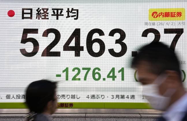 Tokyo stocks plunge A stock monitor in Tokyo shows the 225-issue Nikkei Stock Average ending over 1,200 points lower on April 2, 2026, from the previous day s close.  A14AA0005432689P