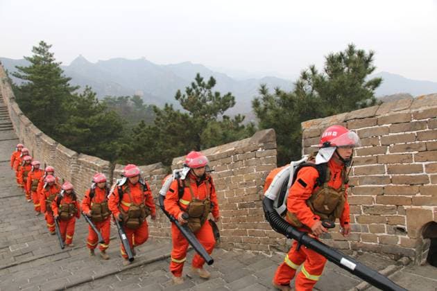 Fire Patrol CHENGDE, CHINA - APRIL 3, 2026 - Firefighting team members from Bakeshiying Forest Farm of Luanping State owned Forest Farm conducted fire prevention inspections in Jinshanling Great Wall Scenic Area in Chengde City, Hebei Province, China on April 3, 2026. Chengde Hebei China  Copyright: xCFOTOx i1775295102651