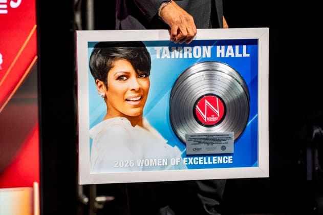 April 4, 2026, Philadelphia, Pennsylvania, United States: DERRICK CORBETT, Senior Vice President of Programming for iHeartMedia holds an award to present to TAMRON HALL, American broadcast journalist, television talk show host and author, receives the WDAS-FM tenth annual Women Of Excellence Legend award at the luncheon held at the Philadelphia Sheraton Philadelphia United States - ZUMArf1_ 20260404_zaf_rf1_031 Copyright: xRickyxFitchettx