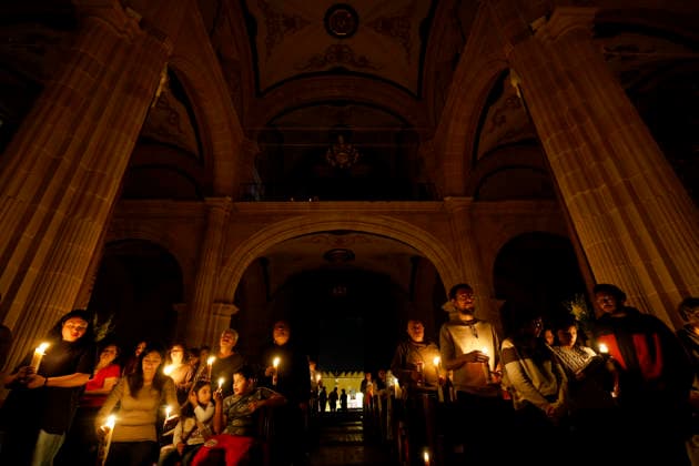 April 4, 2026, Zacatecas, Zacatecas, Mexico: Catholic parishioners hold candles during the Easter Vigil celebration at the Santo Domingo Temple in Zacatecas, Mexico. The liturgical celebration commemorates the resurrection of Jesus. Zacatecas Mexico - ZUMAo125 20260404_zip_o125_012 Copyright: xAntonioxOjedax