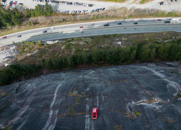 April 6, 2026, Squamish, Bc, CANADA: The shell of a Volkswagen Beetle hangs suspended on a cliff above the Sea-to-Sky Highway, in Squamish, B.C., on Monday, April 6, 2026. The vehicle appeared on the rock face last week with a large E on its roof, indicating that University of British Columbia engineering students were carrying on a long-standing tradition of placing the shell in difficult to reach locations. British Columbia s Environment Ministry is urging people to stay away from the area as they work on a plan to remove it. Squamish CANADA - ZUMAc35_ 20260406_zaf_c35_018 Copyright: xDarrylxDyckx