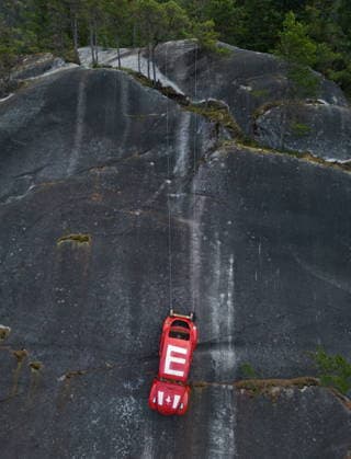 April 6, 2026, Squamish, Bc, CANADA: The shell of a Volkswagen Beetle hangs suspended on a cliff above the Sea-to-Sky Highway, in Squamish, B.C., on Monday, April 6, 2026. The vehicle appeared on the rock face last week with a large E on its roof, indicating that University of British Columbia engineering students were carrying on a long-standing tradition of placing the shell in difficult to reach locations. British Columbia s Environment Ministry is urging people to stay away from the area as they work on a plan to remove it. Squamish CANADA - ZUMAc35_ 20260406_zaf_c35_022 Copyright: xDarrylxDyckx