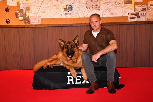 Maximilian Brueckner and sheepdog Rex at the Commissioner Rex SAT1 premiere on 8 04 2026 in the Astor Film Lounge at the ARRI cinema in Munich Premiere in Munich Commissioner Rex barks again on TV on Sat 1