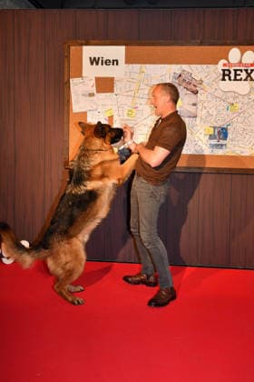 Maximilian Brueckner and German shepherd Rex arrive at the Kommissar Rex Season Premiere at Astor Film Lounge on April 8, 2026 in Munich, Germany Kommissar Rex Season Premiere in Munich, Germany