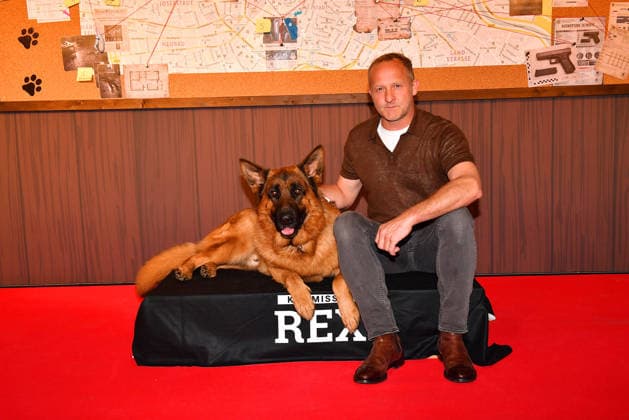 Maximilian Brueckner and German shepherd Rex arrive at the Kommissar Rex Season Premiere at Astor Film Lounge on April 8, 2026 in Munich, Germany Kommissar Rex Season Premiere in Munich, Germany