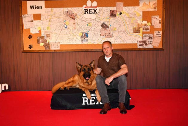 Maximilian Brueckner and German shepherd Rex arrive at the Kommissar Rex Season Premiere at Astor Film Lounge on April 8, 2026 in Munich, Germany Kommissar Rex Season Premiere in Munich, Germany