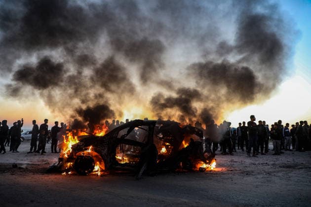 (260408) -- GAZA CITY, April 8, 2026 -- Photo taken on April 8, 2026 shows a vehicle burning after being hit by an Israeli airstrike in which an Al Jazeera journalist was killed, in Gaza City. Four Palestinians, including a journalist, were killed on Wednesday in two separate incidents of Israeli airstrikes on Gaza City, according to Palestinian security and medical sources. Palestinian security sources told Xinhua that one of the dead was journalist Mohammed Wishah, who worked for Al Jazeera Mubasher, a Doha-based public affairs television network. (Photo by Xinhua) MIDEAST-GAZA CITY-ISRAELI AIRSTRIKE-JOURNALIST KILLED RizekxAbdeljawad 