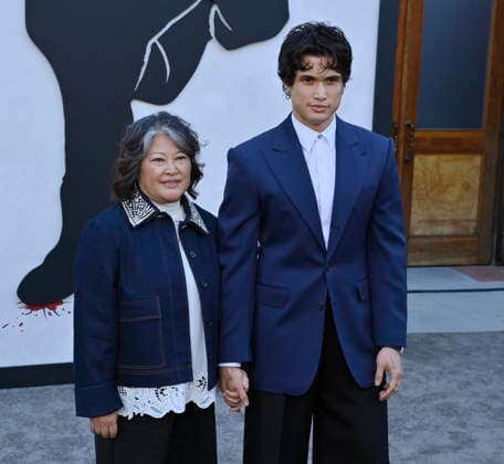 Cast member Charles Melton and his mother Sukyong Melton attend Netflix s dark comedy TV series Beef at the Egyptian Theatre in the Hollywood section of Los Angeles on Wednesday, April 8, 2026. Storyline: Road rage ensues after a parking-lot incident, resulting in a bitter feud between the two antagonists. The vendetta between them and the lengths they ll go to in order to wreak revenge on each other spirals out of control, jeopardizing everything and everyone in their lives.  LAP2026040854 JIMxRUYMEN