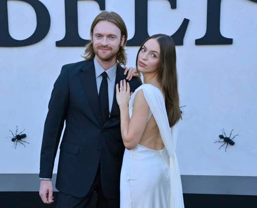 Songwriter Finneus (L) and his wife Claudia Sulewski attend Netflix s dark comedy TV series Beef at the Egyptian Theatre in the Hollywood section of Los Angeles on Wednesday, April 8, 2026. Storyline: Road rage ensues after a parking-lot incident, resulting in a bitter feud between the two antagonists. The vendetta between them and the lengths they ll go to in order to wreak revenge on each other spirals out of control, jeopardizing everything and everyone in their lives.  LAP2026040840 JIMxRUYMEN