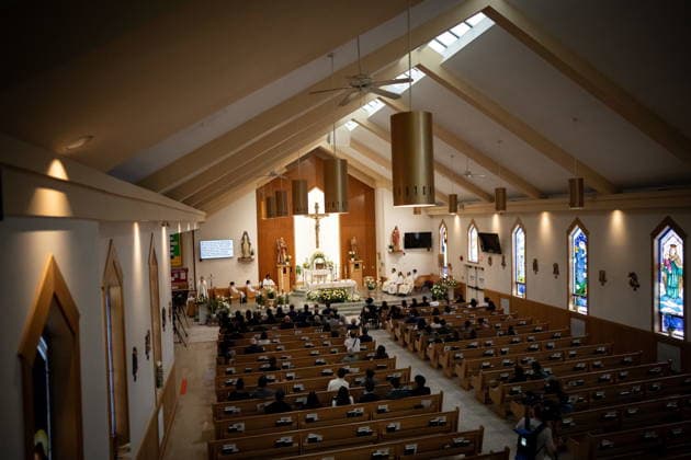April 10, 2026, Bc, CANADA: People attend a Lapu-Lapu day festival tragedy commemoration memorial mass at St. Andrew s Parish in Vancouver, on Friday April 10, 2026. CANADA  - ZUMAc35_ 20260410_zaf_c35_043 Copyright: xEthanxCairnsx