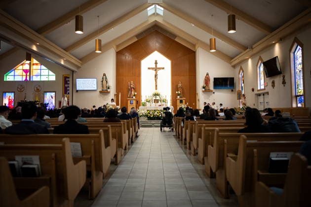 April 10, 2026, Bc, CANADA: Victim Aj Sico, centre, attends a Lapu-Lapu festival tragedy commemoration memorial mass at St. Andrew s Parish in Vancouver, on Friday April 10, 2026. CANADA  - ZUMAc35_ 20260410_zaf_c35_048 Copyright: xEthanxCairnsx