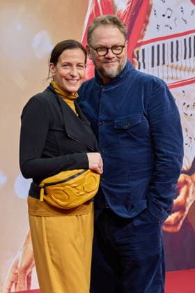 Ulrike Frank with husband Marc Schubring International Premiere Global Fan Celebration of Michael at the Uber Eats Music Hall in Berlin on 10 04 2026 Cinema premiere Michael