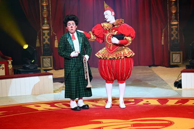 Clowns Kevinski Kevin Gorczynski Canutito Jr Alan Dereck and white clown Gensi Fulgenci Mestres performing in the ring at the Cologne premiere of Circus Roncalli