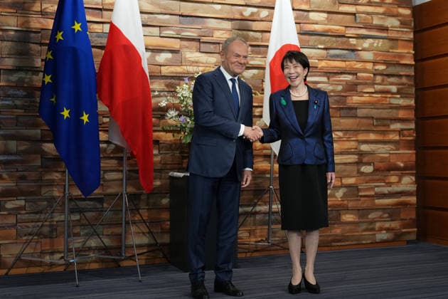 Sanae Takaichi - Donald Tusk meeting in Japan TOKYO, JAPAN - APRIL 15: (----EDITORIAL USE ONLY - MANDATORY CREDIT - HIRO KOMAE AP POOL - NO MARKETING NO ADVERTISING CAMPAIGNS - DISTRIBUTED AS A SERVICE TO CLIENTS----) Japan s Prime Minister Sanae Takaichi, right, and Poland s Prime Minister Donald Tusk shake hands as they pose for a photo before their talk at the prime minister s office in Tokyo, Japan on April 15, 2026. AP Hiro Komae POOL Anadolu Tokyo Japan. Editorial use only. Please get in touch for any other usage.  Copyright: x2026xAnadoluxAP HiroxKomae POOLx