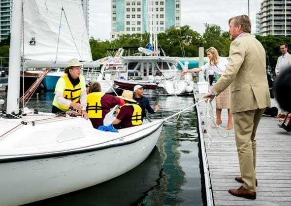 MIAMI - King Willem-Alexander and Queen Maxima are being shown around the Shake-a-Leg Marina, where they receive an explanation of the work of this organization that makes water sports accessible to people with disabilities. The visit was part of a three-day working visit to Philadelphia, Washington D.C., and Miami in the United States (US). REMKO DE WAAL ANP netherlands out - belgium out  Copyright: xx x555864867x originalFilename: 555864867.jpg