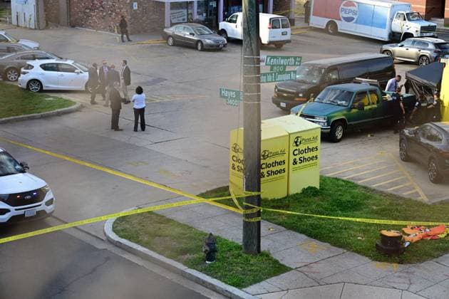 RECORD DATE NOT STATED Two Children Killed After Shooting In Northeast Washington DC (NEW) Members of the Metropolitan Police Department work at the scene in the area of Kenilworth Avenue NE and Hayes Street NE where 14-year-old Tyale Coates was fatally shot and pronounced dead on scene while 12-year-old Mhilo Young was shot and pronounced dead at the hospital in the Mayfair neighborhood of Washington, DC. April 14, 2026, Washington, DC, USA: Police report that possibly two shooters approached the victims and opened fire. Several evidence markers are located at the scene, including a tent which covered the body of 14-year-old Tyale Coates. Medical examiner personnel removed Tyale Coates body from the scene. 12-year-old Mhilo Young was shot and pronounced dead at  Copyright: xKylexMazzax