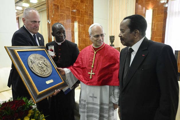 Pope Leo XIV Apostolic Visit To Cameroon Pope Leo XIV is welcomed by the President of the Republic of Cameroon Paul Biya at the Presidential Palace in Yaoundé, Cameroon on April 15, 2026, on the first day of his Apostolic Journey to this country. Photo by (EV) Simone Risoluti Vatican Media ABACAPRESS.COM Yaounde Cameroon  Copyright: xABACAx