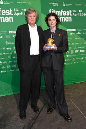 David Hare and Daisy Bevan at the presentation of the Bremen Film Prize of the Sparkasse for Vanessa Redgrave at the 11 Filmfest Bremen in the large hall of the Theater am Goetheplatz Bremen, 15 04 2026 Foto:xC.xNiehausx xFuturexImagex filmpreis_6417