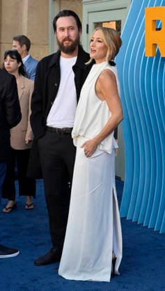 Cast member Kate Hudson and musician Danny Fujikawa attend the premiere of Netflix s Season 2 TV series sport comedy Running Point at the Egyptian Theatre in the Hollywood section of Los Angeles on Wednesday, April 15, 2026..Storyline: Isla Gordon, overlooked her whole life, is appointed President of the LA Waves basketball team, a family business, when her brother enters rehab. She aims to prove she is the right choice despite skepticism.  LAP2026041502 JIMxRUYMEN