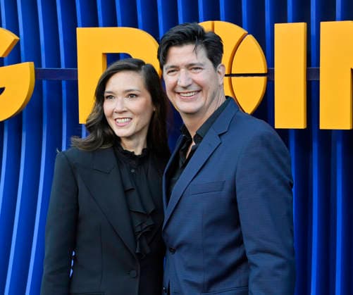 Cast member Ken Marino (R) and his wife Erica Oyama attend the premiere of Netflix s Season 2 TV series sport comedy Running Point at the Egyptian Theatre in the Hollywood section of Los Angeles on Wednesday, April 15, 2026. Storyline: Isla Gordon, overlooked her whole life, is appointed President of the LA Waves basketball team, a family business, when her brother enters rehab. She aims to prove she is the right choice despite skepticism.  LAP2026041555 JIMxRUYMEN