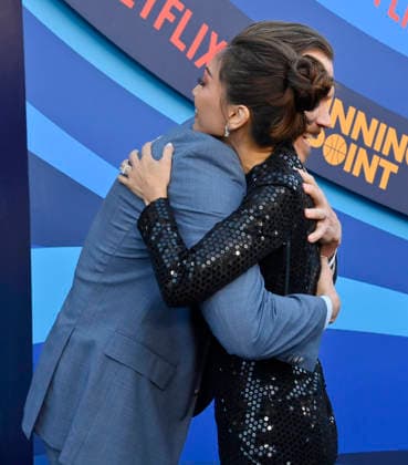 Cast members Scott MacArthur (L) and Brenda Song attend the premiere of Netflix s Season 2 TV series sport comedy Running Point at the Egyptian Theatre in the Hollywood section of Los Angeles on Wednesday, April 15, 2026. Storyline: Isla Gordon, overlooked her whole life, is appointed President of the LA Waves basketball team, a family business, when her brother enters rehab. She aims to prove she is the right choice despite skepticism.  LAP2026041533 JIMxRUYMEN