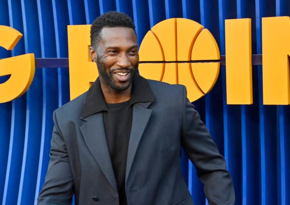 Cast member Justin Hurt-Dunkley attends the premiere of Netflix s Season 2 TV series sport comedy Running Point at the Egyptian Theatre in the Hollywood section of Los Angeles on Wednesday, April 15, 2026. Storyline: Isla Gordon, overlooked her whole life, is appointed President of the LA Waves basketball team, a family business, when her brother enters rehab. She aims to prove she is the right choice despite skepticism.  LAP2026041550 JIMxRUYMEN