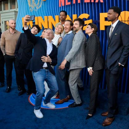 Ted Sarandos takes a selfie off cast members during the premiere of Netflix s Season 2 TV series sport comedy Running Point at the Egyptian Theatre in the Hollywood section of Los Angeles on Wednesday, April 15, 2026. Storyline: Isla Gordon, overlooked her whole life, is appointed President of the LA Waves basketball team, a family business, when her brother enters rehab. She aims to prove she is the right choice despite skepticism.  LAP2026041510 JIMxRUYMEN